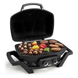 The Napoleon TravelQ PRO285 with its lid open, with burgers, sausages, and a variety of other foods on its grill grate.